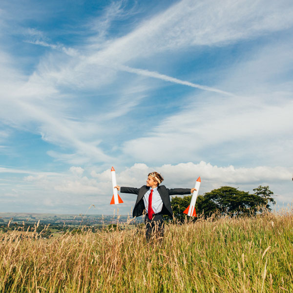 Boy playing with rockets